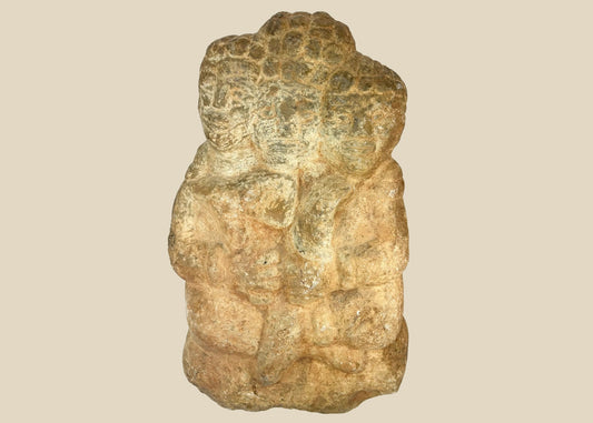 Majapahit Era three-faced stone sculpture of Brahma from 14th–15th century Java, carved from volcanic andesite, featuring serene tri-directional faces and a tiered crown, part of Cecil Blocker Collection, Indonesia.