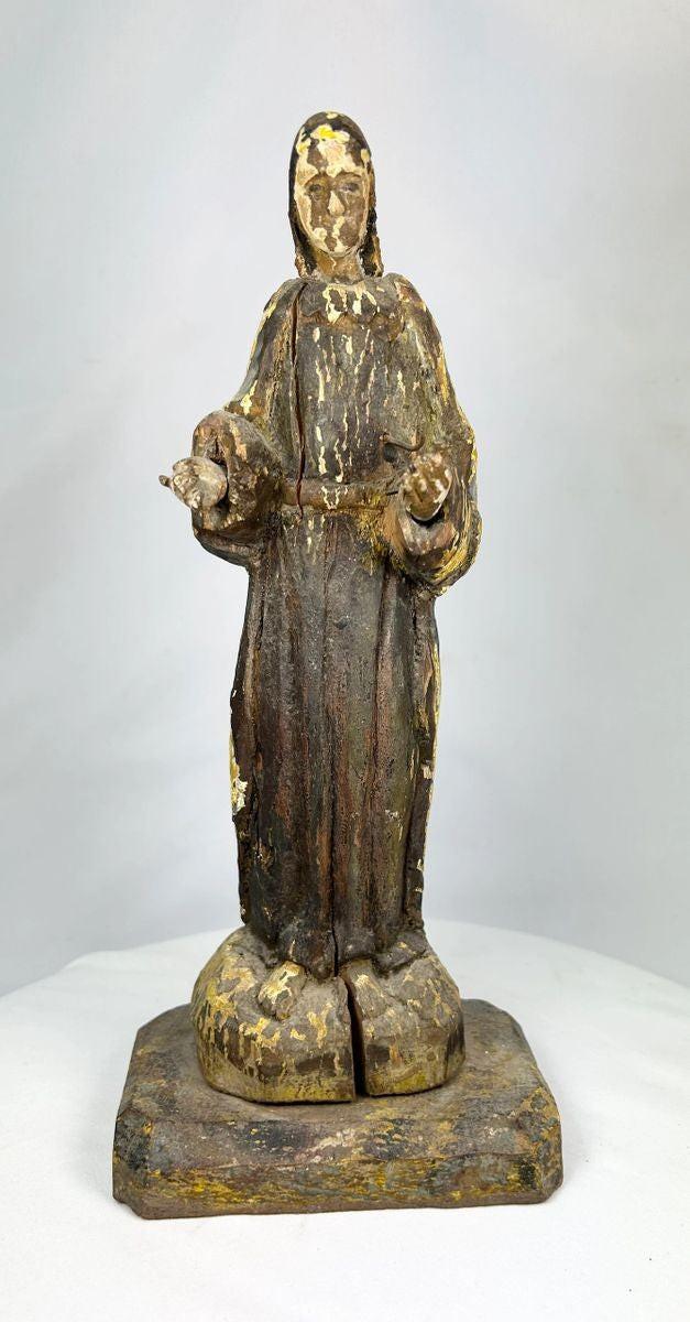 Antique Spanish Colonial wooden devotional statue, circa 18th–19th century, hand-carved with open hands in blessing pose, mounted on pedestal, with remnants of original gilt and polychrome paint, patina, and wear from centuries of use.