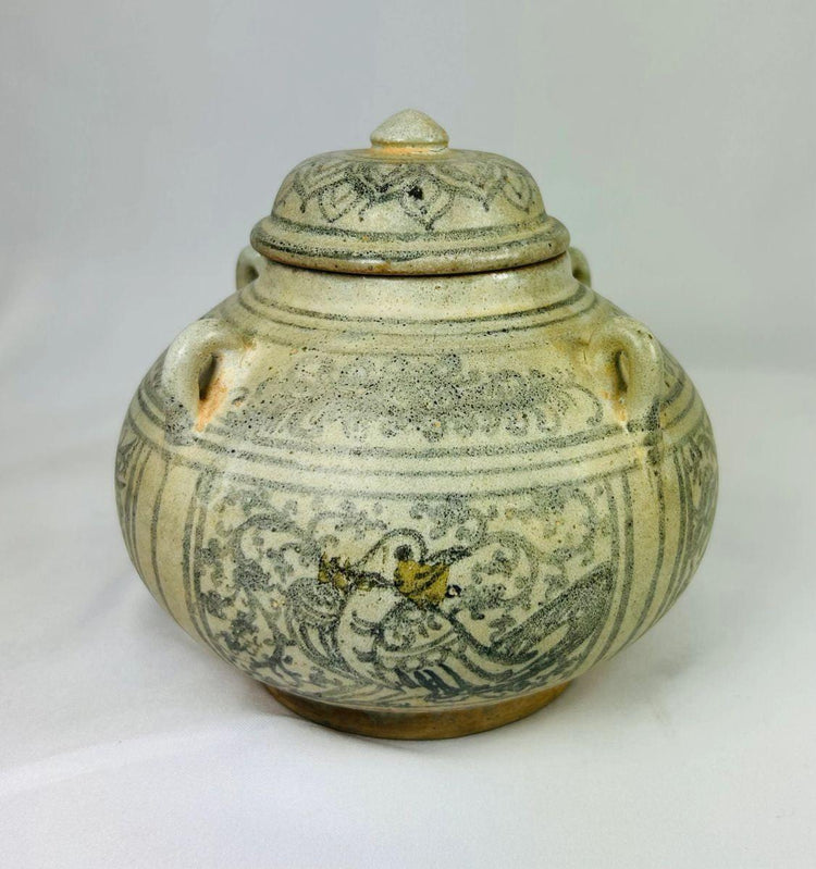 Southeast Asian Sawankhalok bowl, 14th–16th century CE, dark underglaze decoration, birds and floral motifs