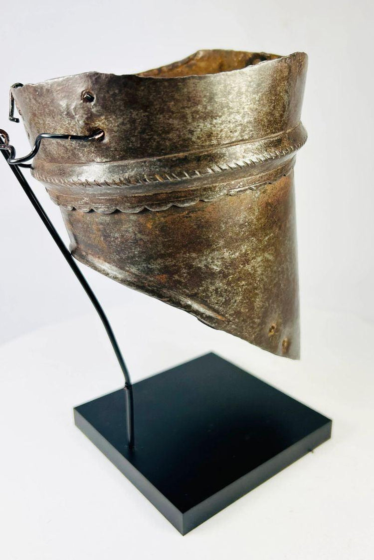 European Renaissance armor plate for upper arm, decorative steel craftsmanship with rivet holes and oxidized antique finish.