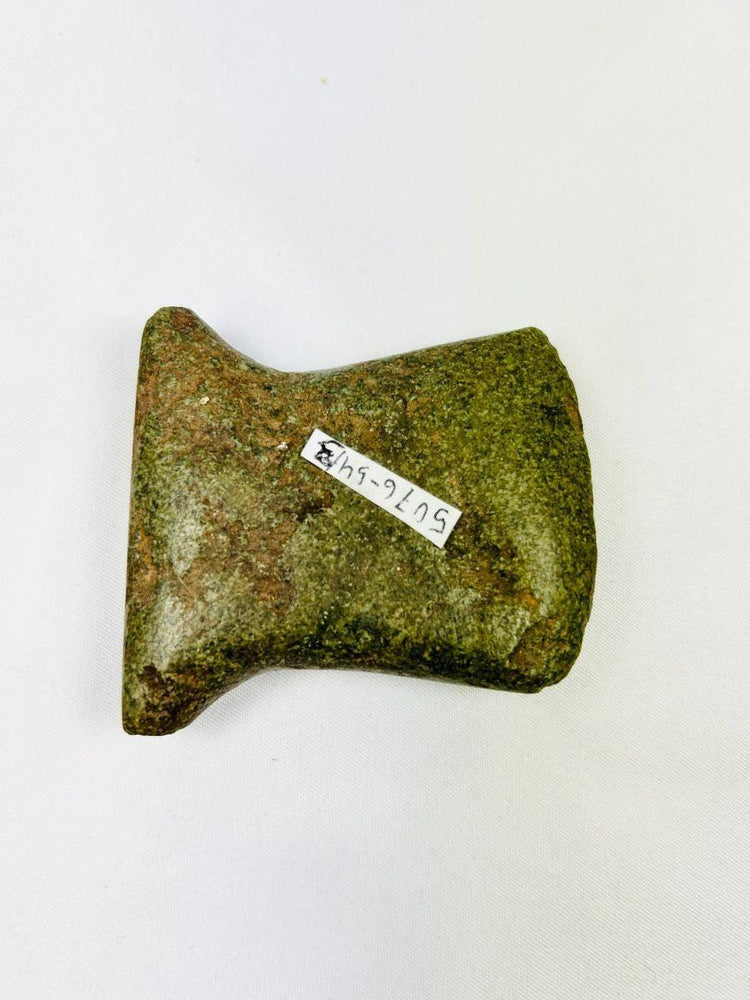 Authentic Andean ground-stone axe with beveled edge and side notches, Pre-Columbian 500–1500 CE.
