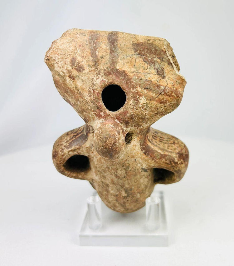 Stylized human figure with incised facial features, Pre-Columbian