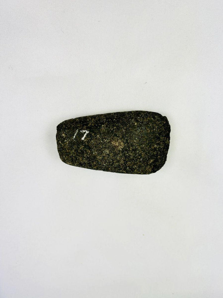 Small utilitarian Andean stone axe with beveled cutting edge and worn patina