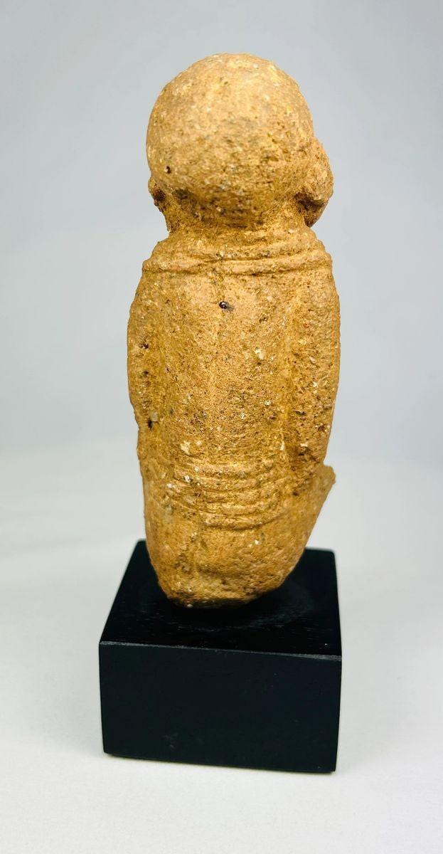 Sokoto culture terracotta figure—rear view highlighting clay texture and form, West Africa 500–200 CE artifact.