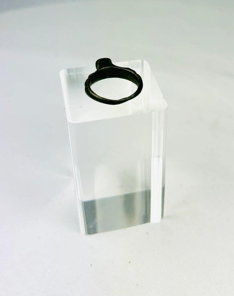 Ancient Roman bronze ring with greenish-black patina formed over centuries