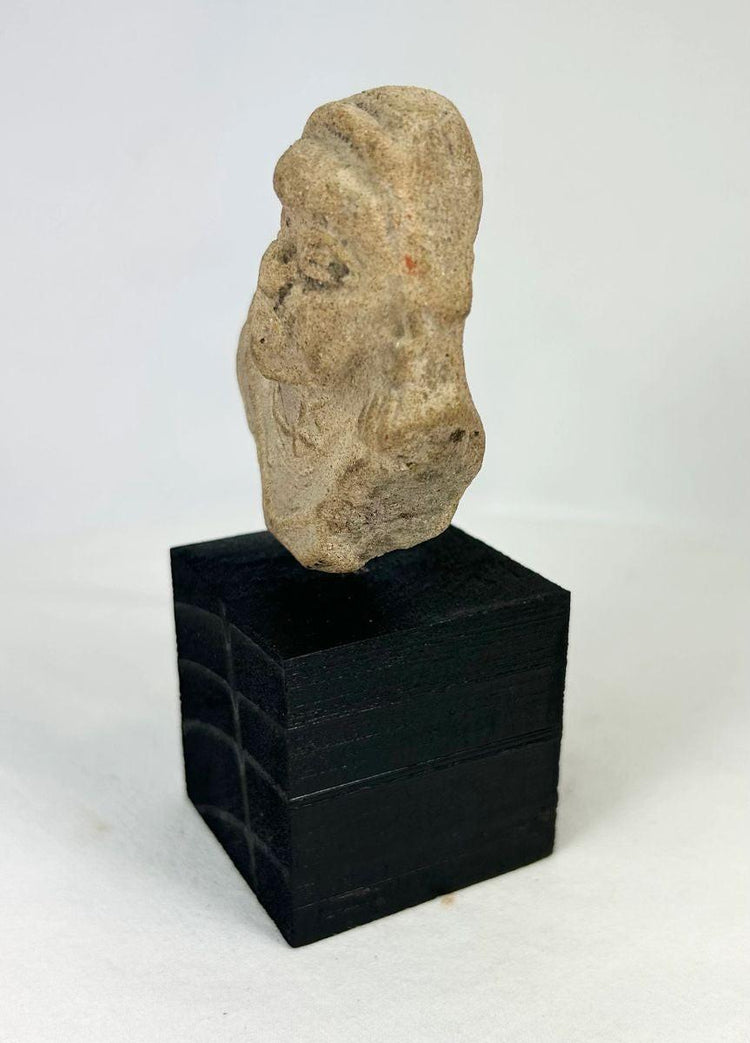 Stylized terracotta anthropomorphic figure fragment from West Mexico