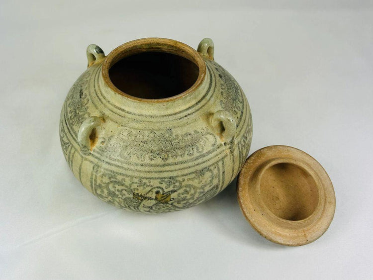 Thai Sawankhalok glazed stoneware bowl, 14th–16th century CE, decorative birds, beasts, and floral patterns