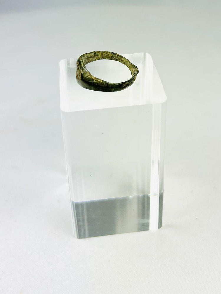 Full view of Roman bronze intaglio ring with centuries-old surface wear and patina.