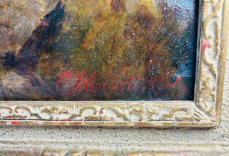 Signature of Edward John Cobbett R.B.A. on Victorian oil painting “Happy Moments,” visible in red paint on lower right corner above ornate gilt gesso frame, circa 1860–1880.