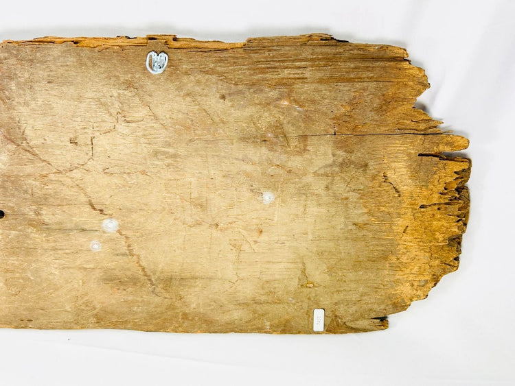 Carved wooden temple fragment with gilded accents and sacred symmetry