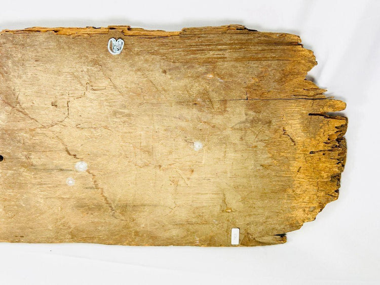 Carved wooden temple fragment with gilded accents and sacred symmetry