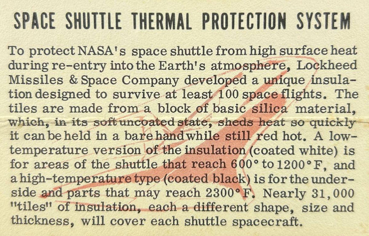 Original NASA Space Shuttle Thermal Protection System label explaining silica insulation tiles, heat resistance, and Lockheed design used in 1980s shuttle program.