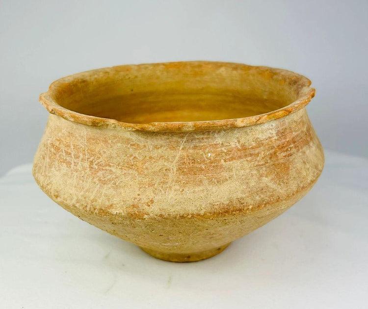 Ancient Bronze Age terracotta bowl with wide shallow form and flared rim
