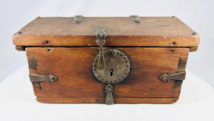 Historic elmwood travel chest from India–Nepal region with original iron hardware and patina.