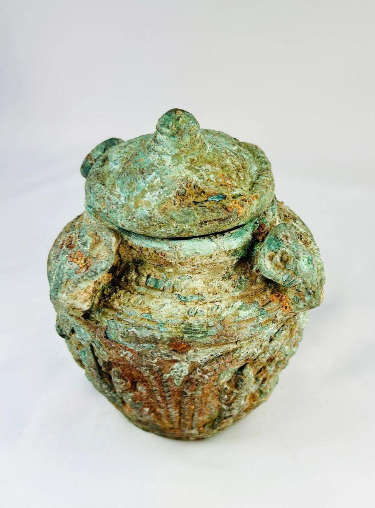 Early Chinese bronze ritual jar with lid and four handles, Shang–Zhou Dynasty, circa 1600–256 BCE, rich green patina and intricate surface motifs.