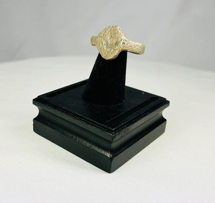 Bronze ring from ancient Persia symbolizing strength and balance