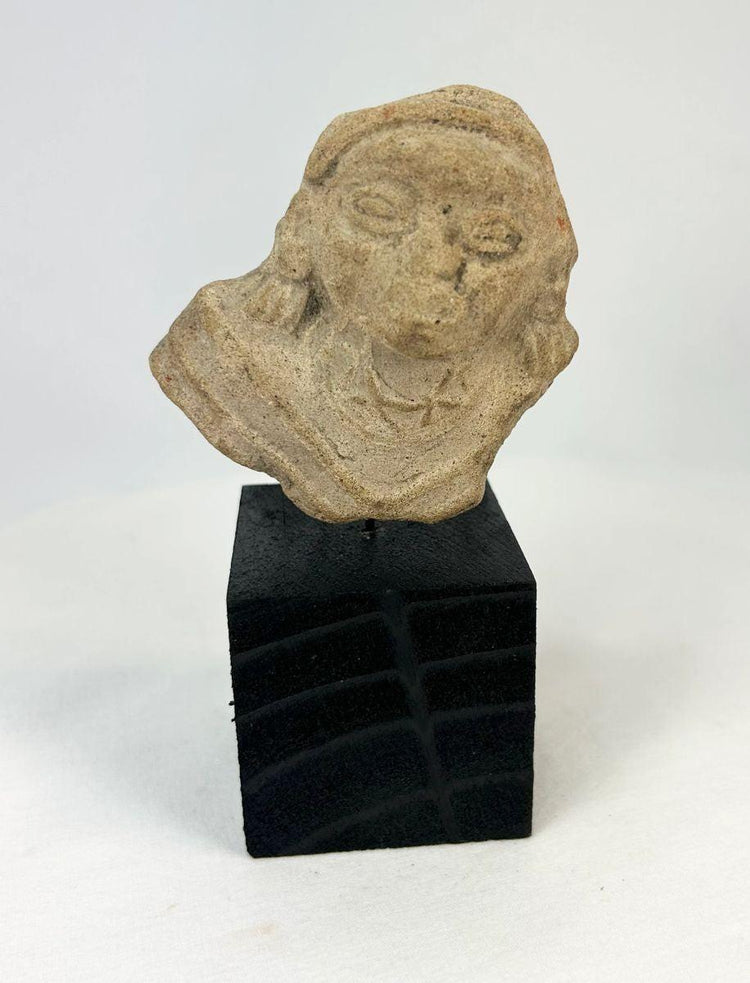 Ancient Mesoamerican terracotta fragment with incised chest details