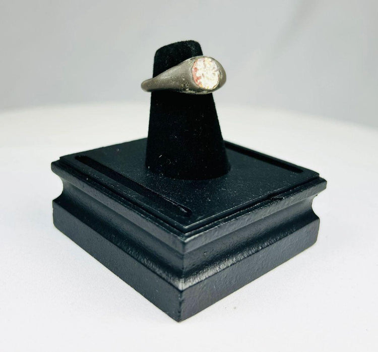 Ancient Near Eastern silver ring used as protective talisman and adornment