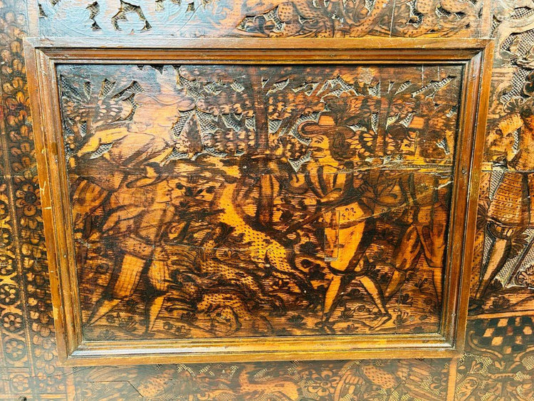 Antique Renaissance wood carving with hunting figures and intricate allegorical detailing, 1500s–1600s.