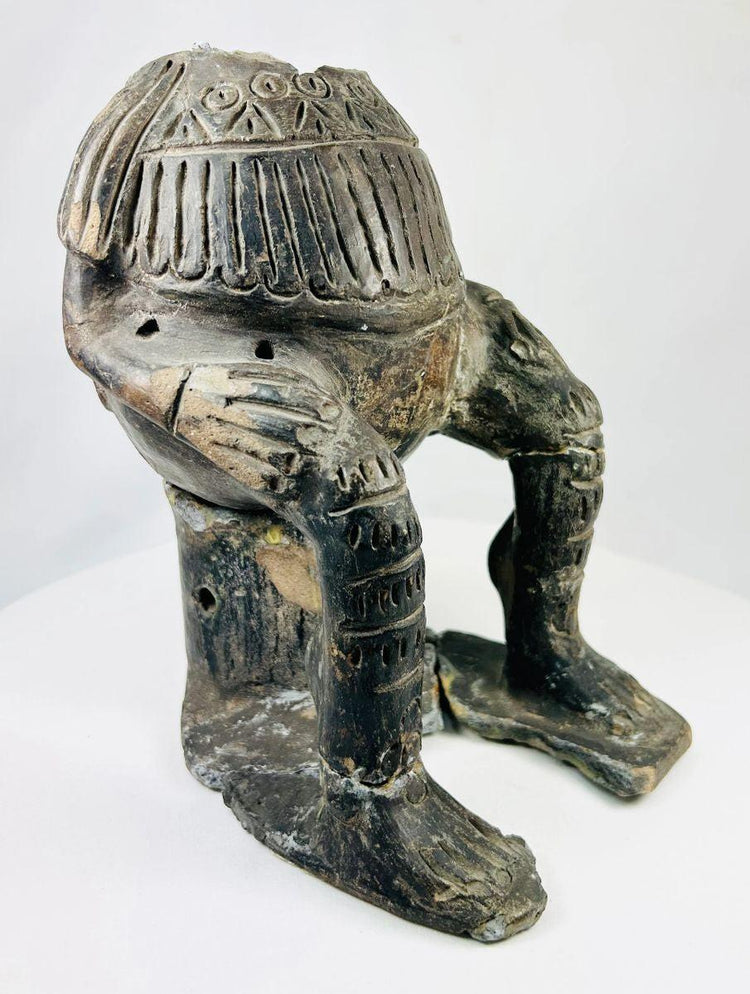 West Mexico terracotta figure with geometric carvings and aged surface