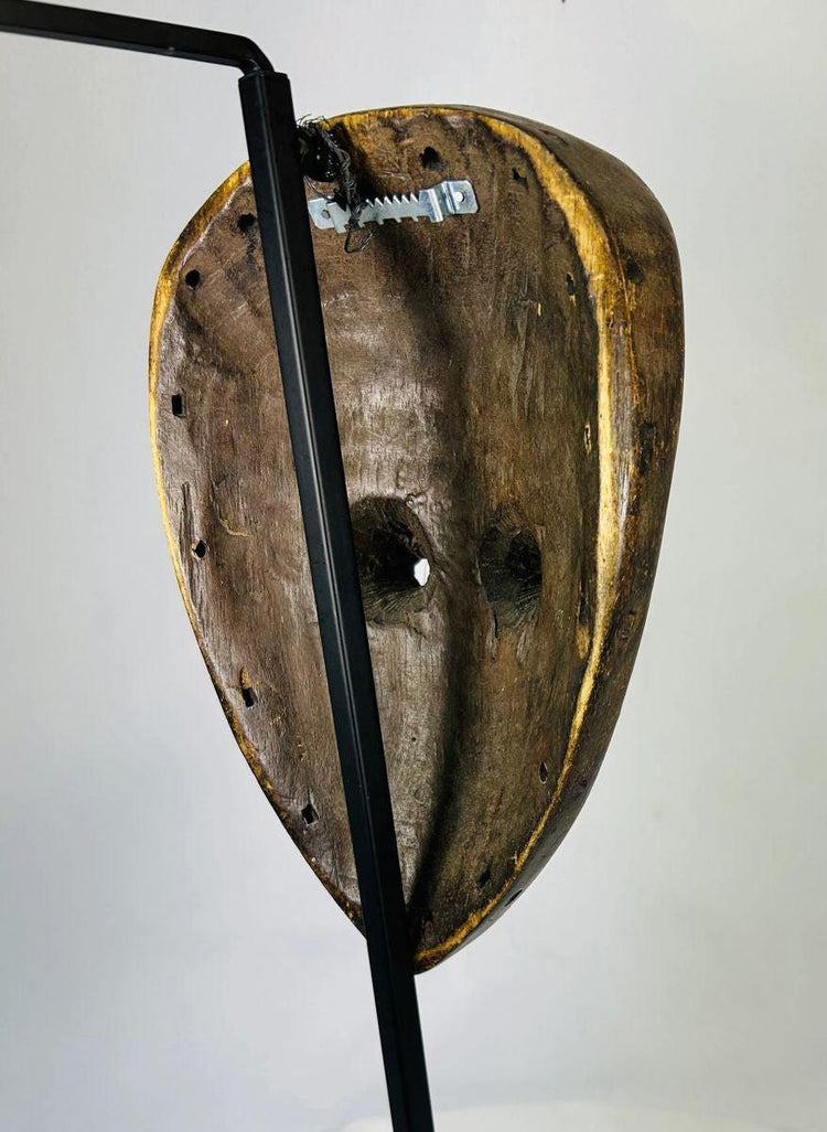 African Baule ritual mask with natural aged patina and incised decorative markings