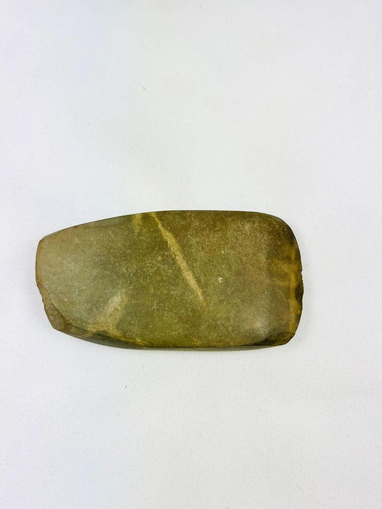 Authentic Pre-Columbian stone axe with rounded use-worn edge and patina