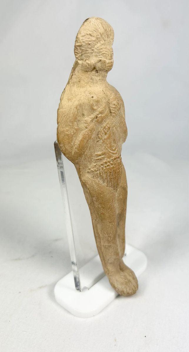 Detailed photograph of Roman terracotta votive figure from 1st–3rd century CE.