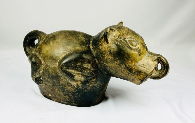 Ancient Peruvian terracotta vessel Moche culture functional and ritual object