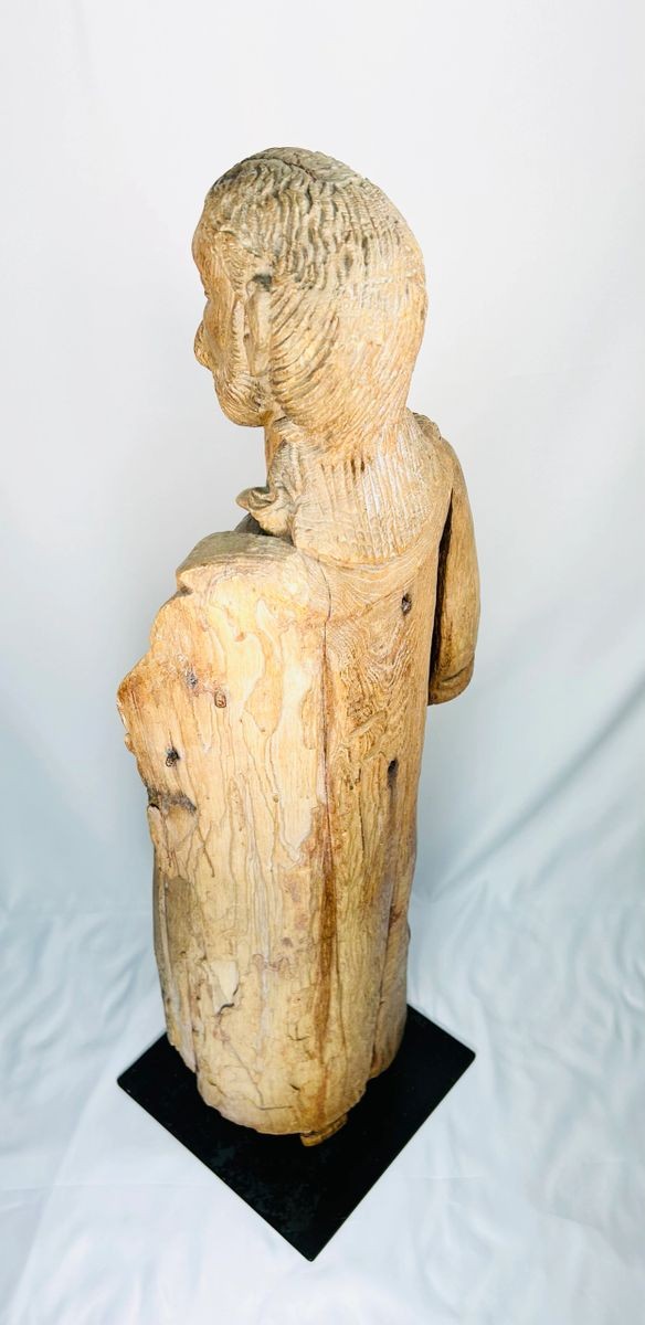 Hand-carved wooden religious figure, 41 inches tall, serene posture and flowing drapery, representing saint or holy icon, medieval to Renaissance European craftsmanship with deep carving and patina.