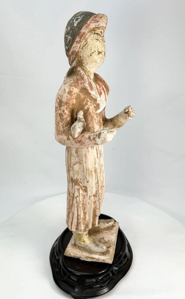 Ancient Chinese court attendant statue from the Tang Dynasty, circa 7th–9th century CE