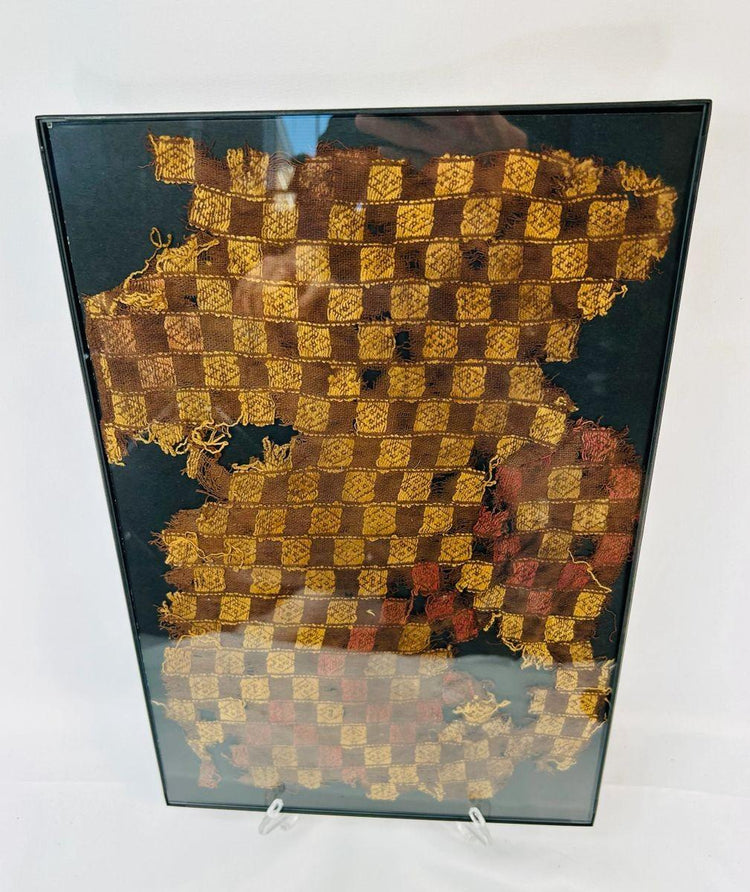 Woven Chancay cotton textile fragment from 1000–1470 CE with natural dyes and geometric motifs.