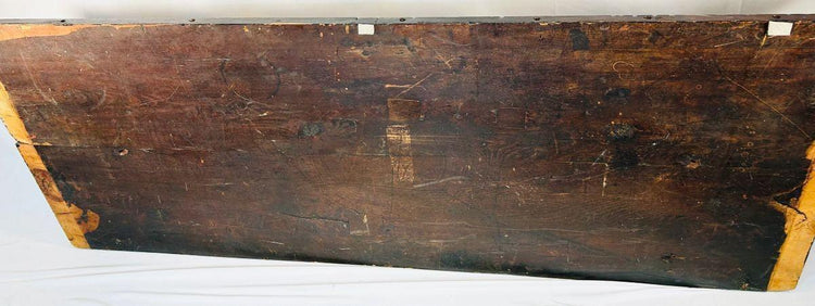 Back side of 16th-century Renaissance carved wooden panel showing aged hardwood surface and structural joinery.