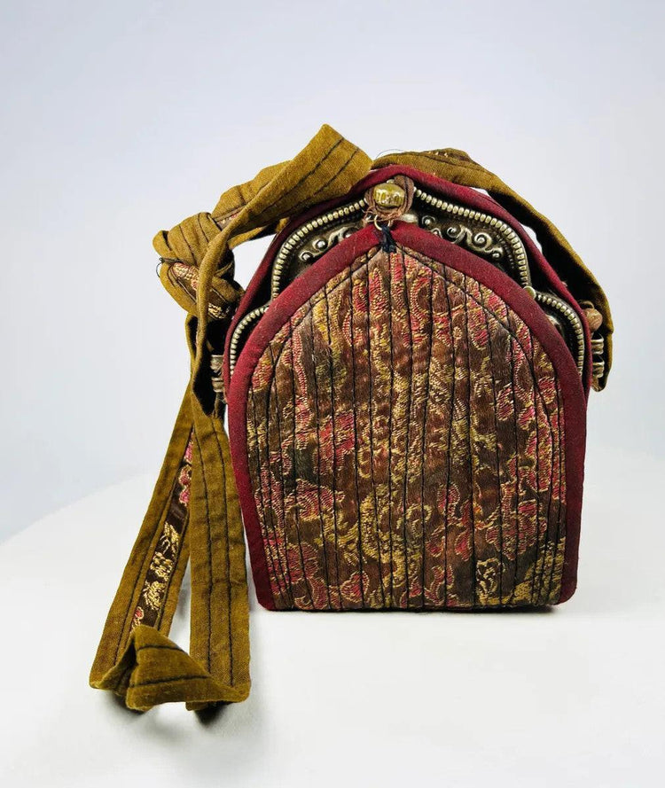 Antique Tibetan gau amulet box with glass window and repoussé silver decoration