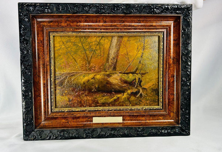 Framed oil painting "Overturned Tree Root" attributed to Thomas Mower Martin, showing a forest scene with rich brown and yellow tones in ornate carved frame.