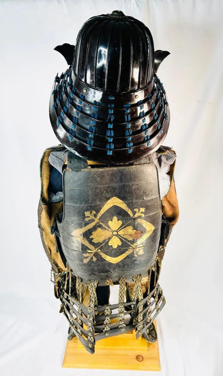 Rear view of Japanese samurai armor with Edo-period silk cords and lacquered back plates, 1333–1573.