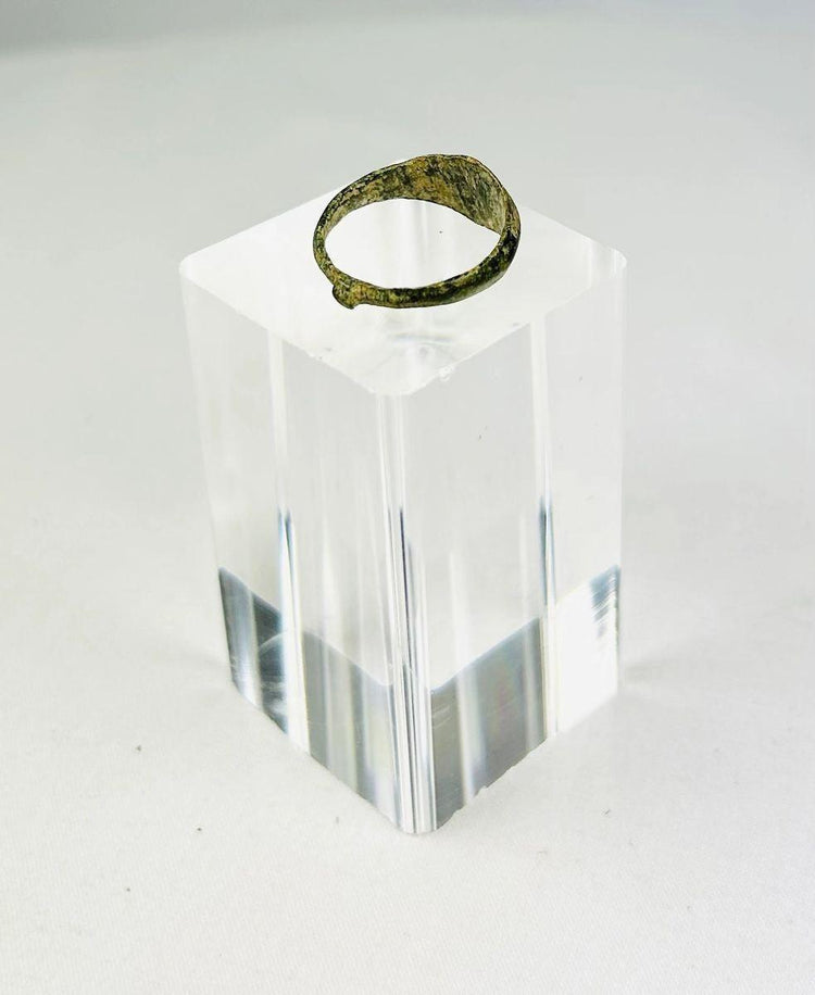 Rear view of ancient Roman bronze ring showing wear and burial patina.