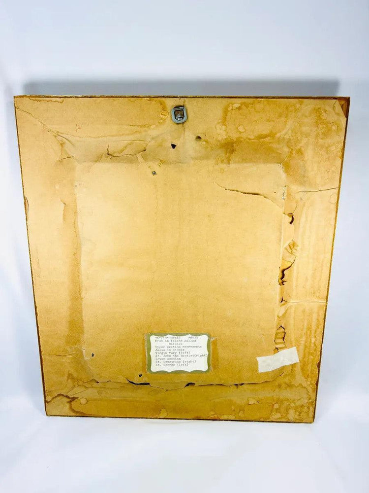Back view of 16th–18th Century hand-painted Greek Orthodox icon on wood showing aged panel, conservation paper backing, and provenance label, Relic and Rarity.