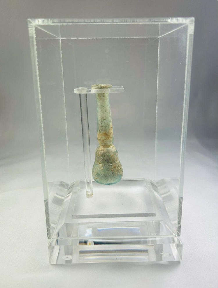 2nd–3rd century CE Roman glass balsamarium, pale turquoise, hand-blown with natural iridescent patina, used for perfumes and ointments