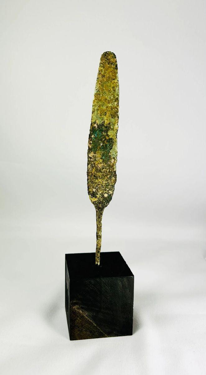 Bronze Age weapon used for hunting or combat with oxidation and aged patina