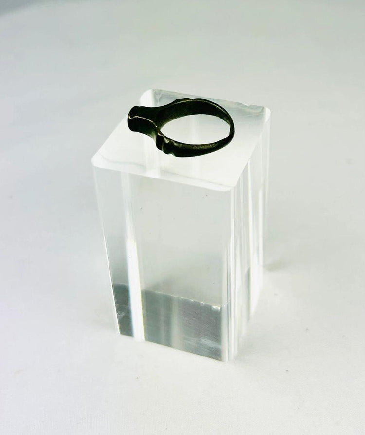 Side view of an ancient Imperial Roman bronze ring displaying classical proportions