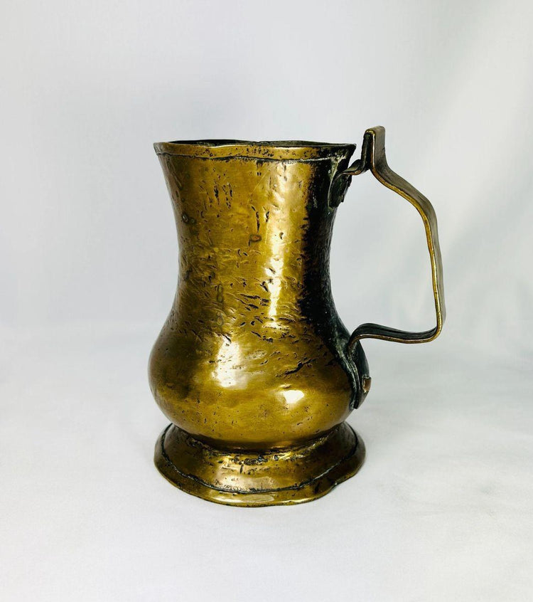 Collectible George II English brass tankard circa 1727–1760 for antique collectors