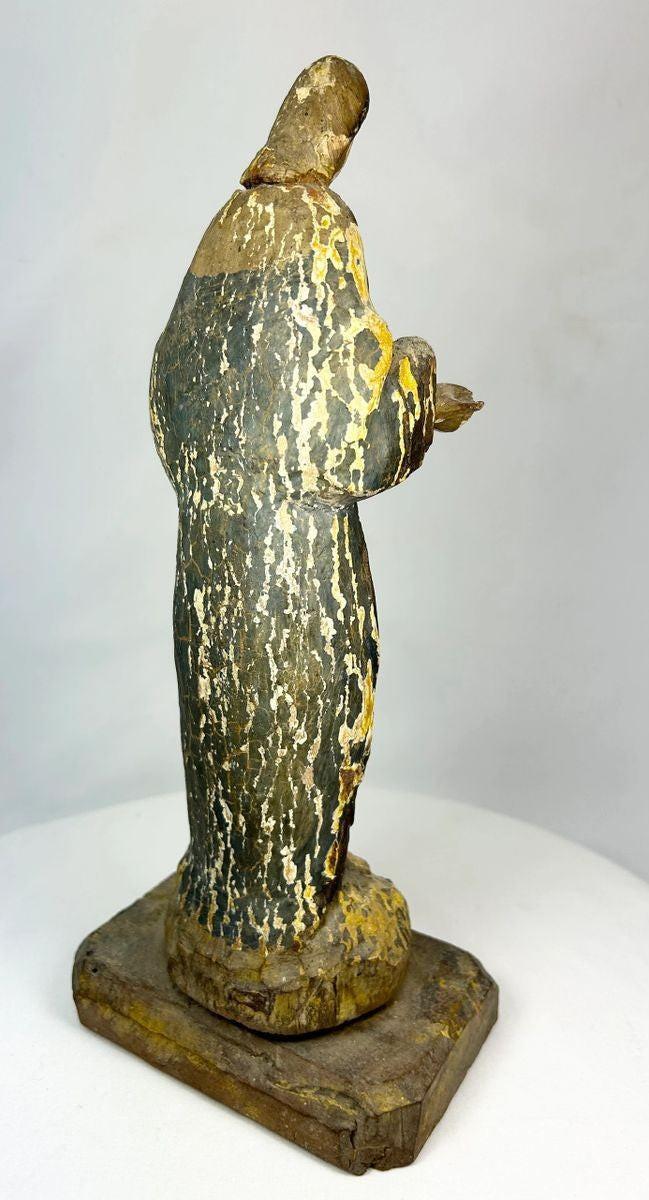 Museum-quality Spanish Colonial hand-carved wooden santo with remnants of polychrome decoration