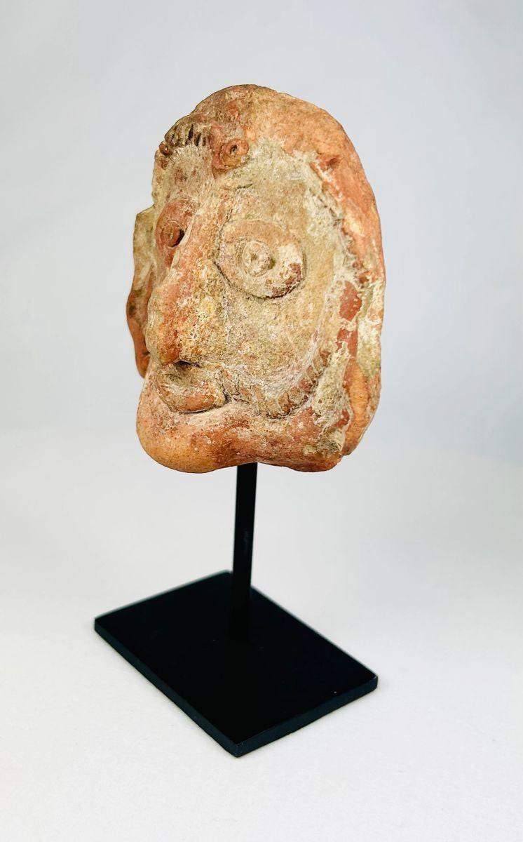 Shunga period terracotta sculptural head showing refined facial modeling from ancient India