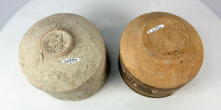 Ancient Harappan terracotta bowls with zigzag and linear geometric patterns