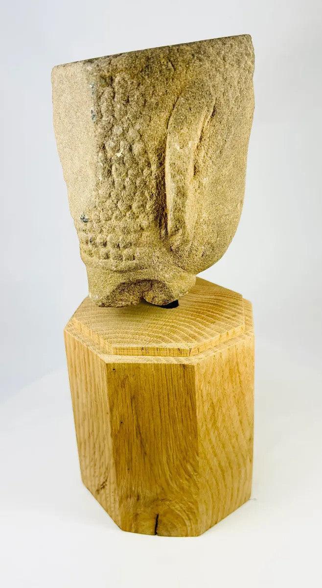 Rear angled view of Khmer Sandstone Buddha Head Fragment from 12th-Century Angkor Period Cambodia, showing detailed hair texture and sandstone weathering, mounted on wooden base – Relic and Rarity.
