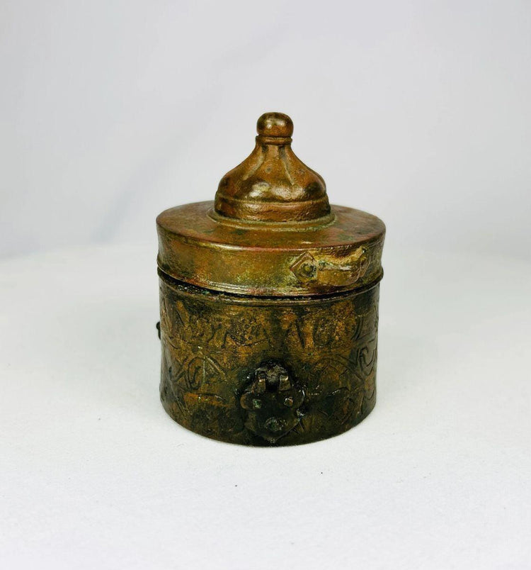 Antique Islamic bronze inkwell with cylindrical body and domed lid, showcasing Khorassan craftsmanship