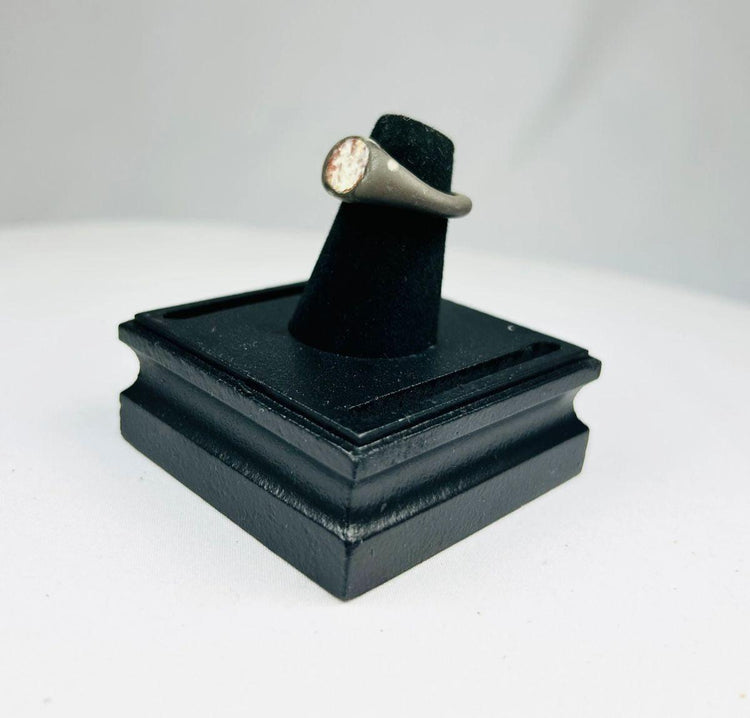 Ancient Mediterranean silver ring with engraved gemstone motif