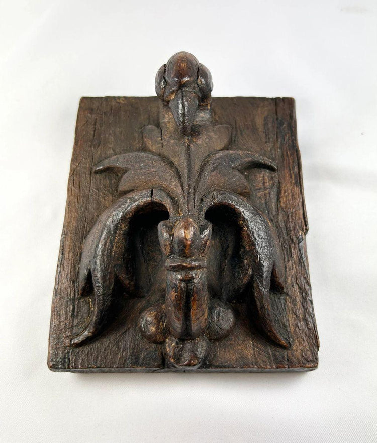 Renaissance-era European devotional panel featuring the Pelican in Her Piety symbol, carved wood with residual paint