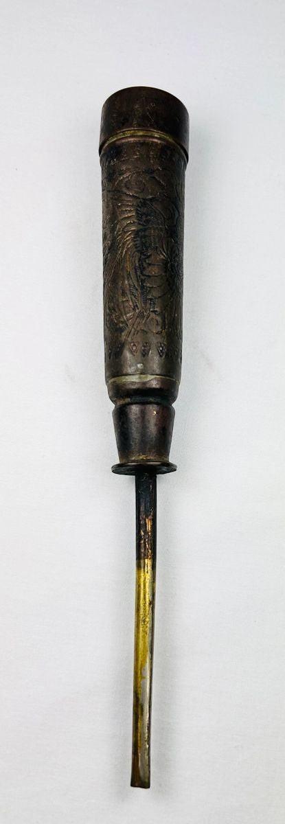 Antique Chinese temple candle holder with cylindrical upper chamber and tapered stem