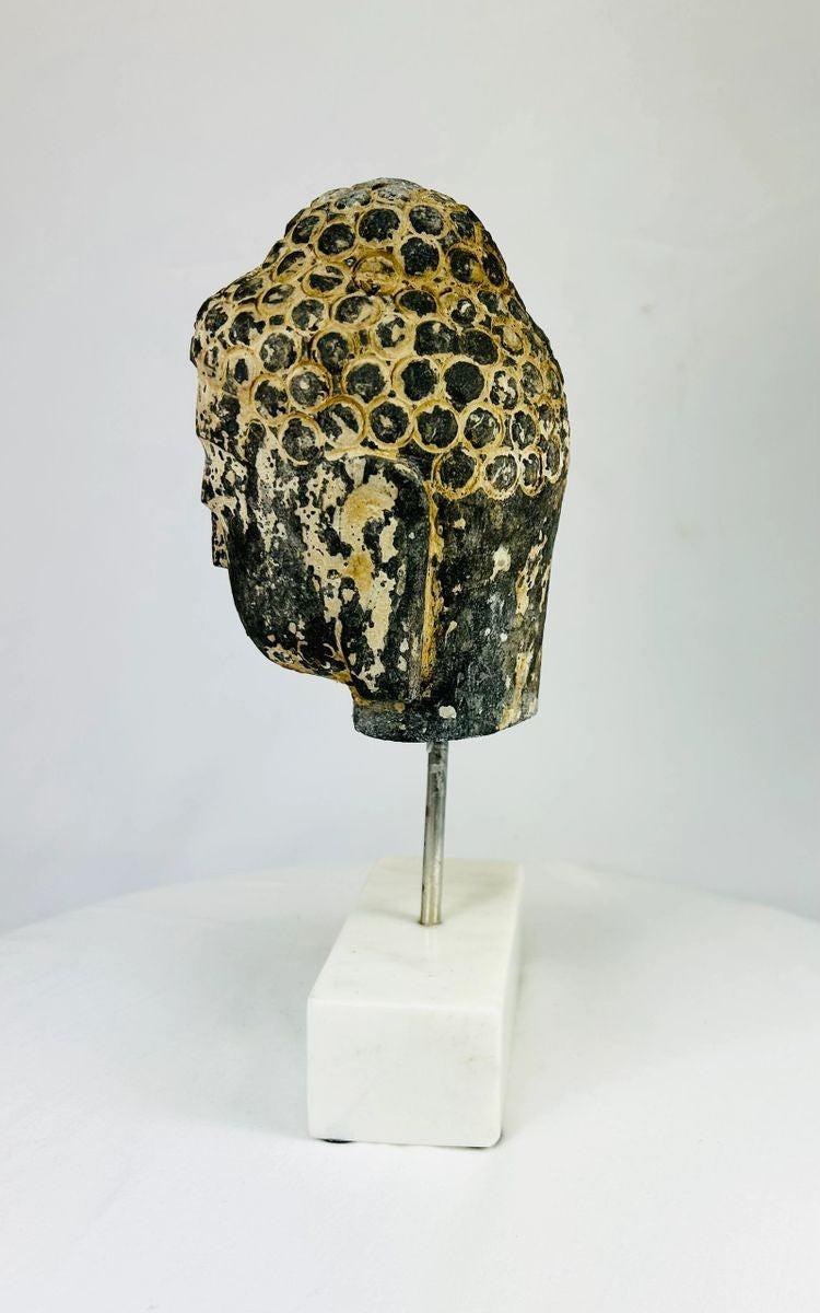 18th–19th century carved stone Buddha head with traces of original pigments